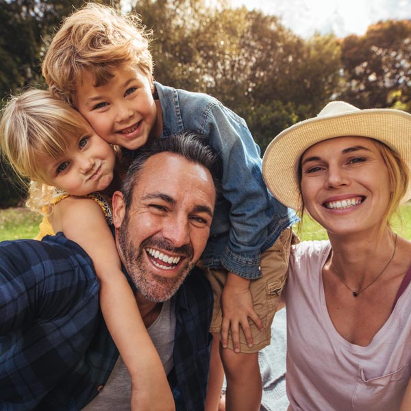 laughing family of four
