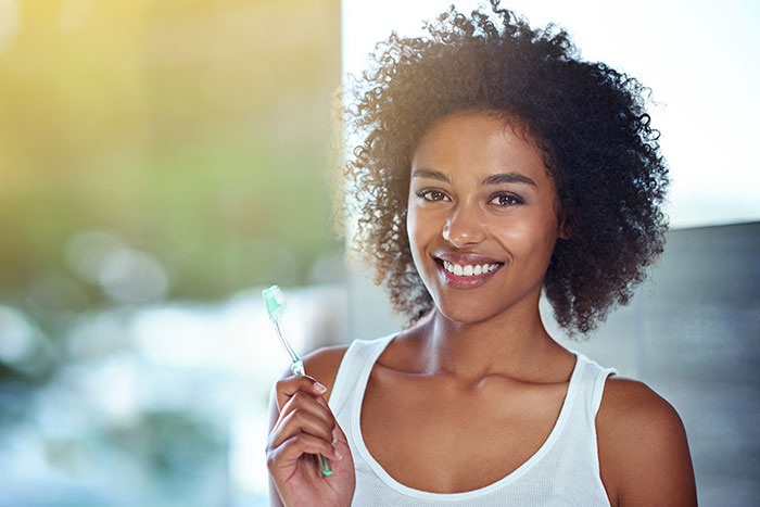 Woman with Toothbrush