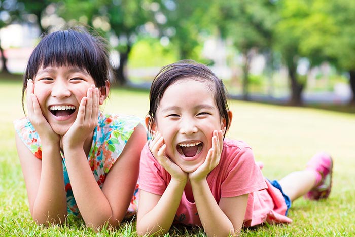 Two Smiling Girls