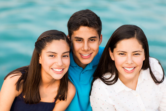 Three Smiling Teenagers