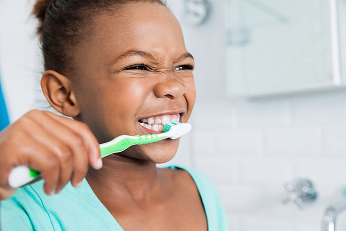 Little Girl Brushing Teeth