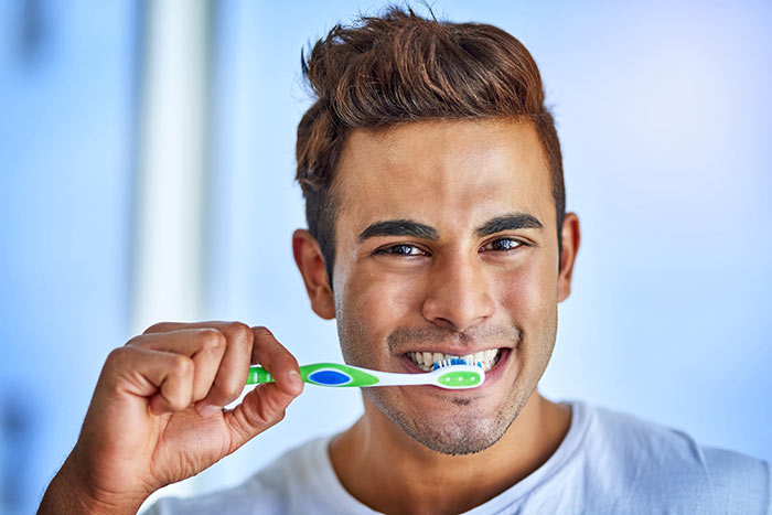 Man Brushing Teeth